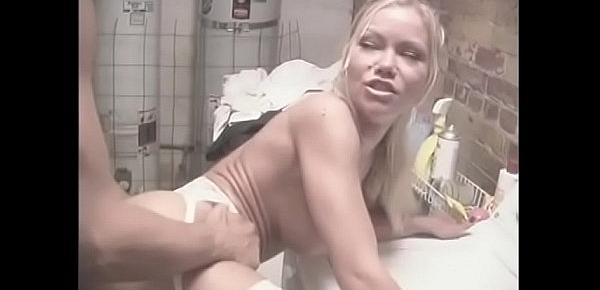  Gorgeous blonde with round tits fucks cancer in the laundry room